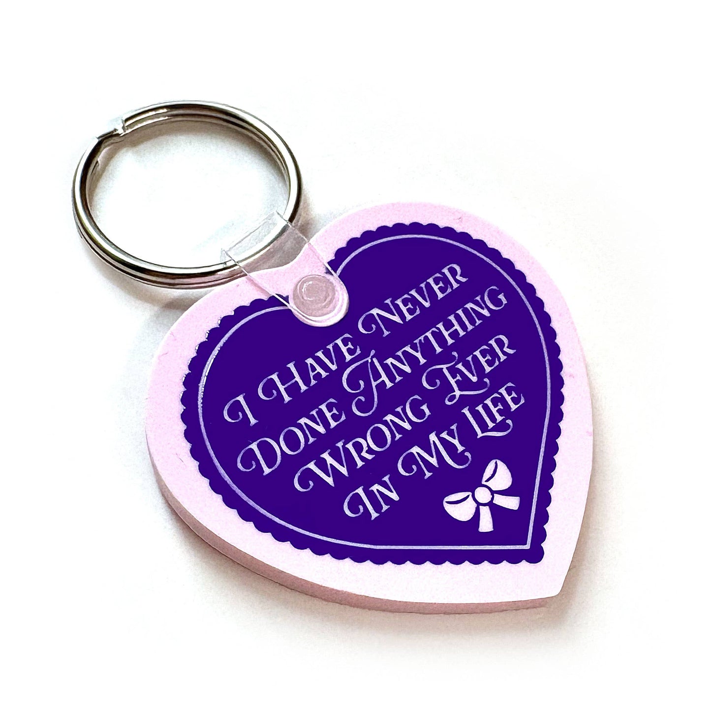 I Have Never Done Anything Wrong Heart Shaped Vinyl Keychain