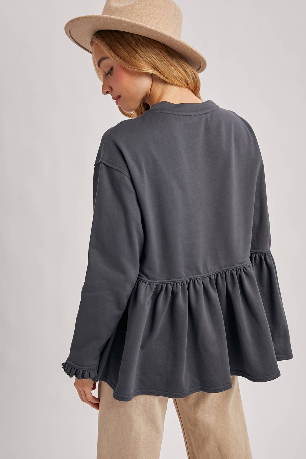 BABYDOLL PEPLUM HEM OVERISZED SWEATSHIRT