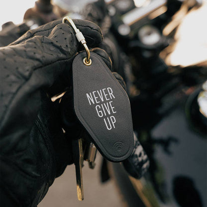Never Give Up Leather Motel Keychain