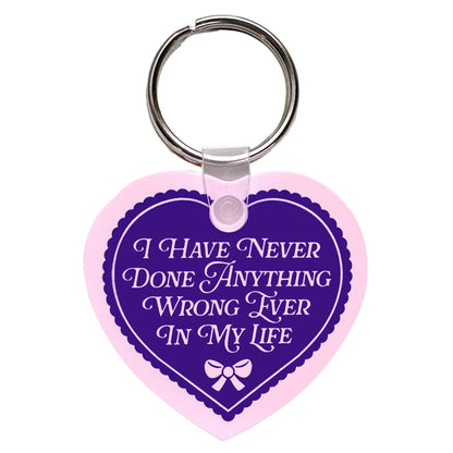 I Have Never Done Anything Wrong Heart Shaped Vinyl Keychain